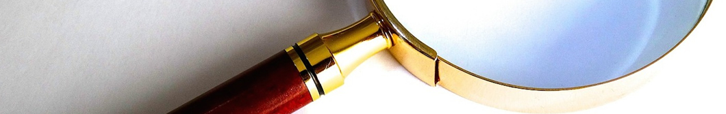 A banner of a magnifying glass.
