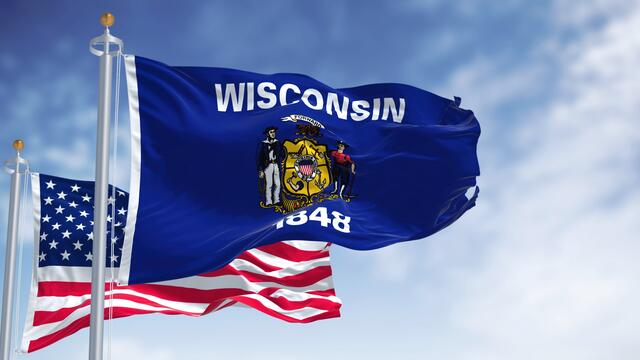 United States amd Wisconsin State flags flying