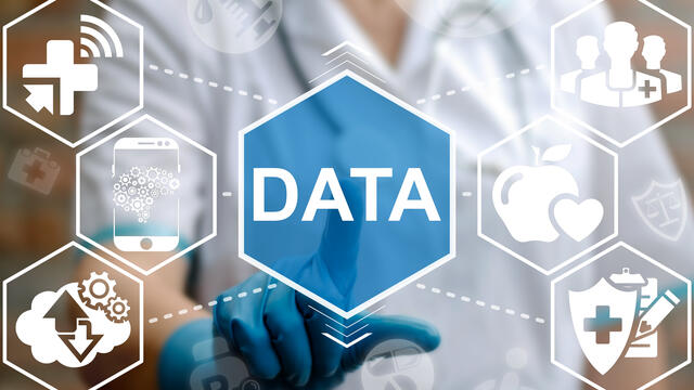 Adult working with a futuristic concept of mobile data integration