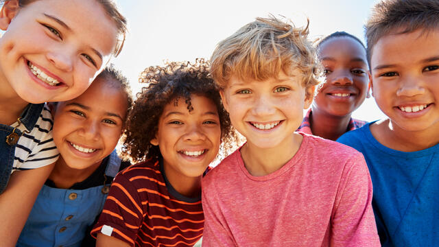 Six smiling kids