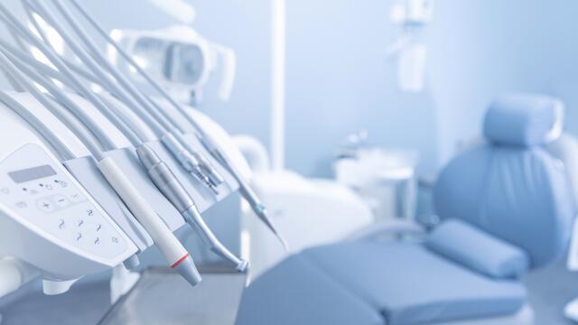 Closeup of dental tools in an exam room