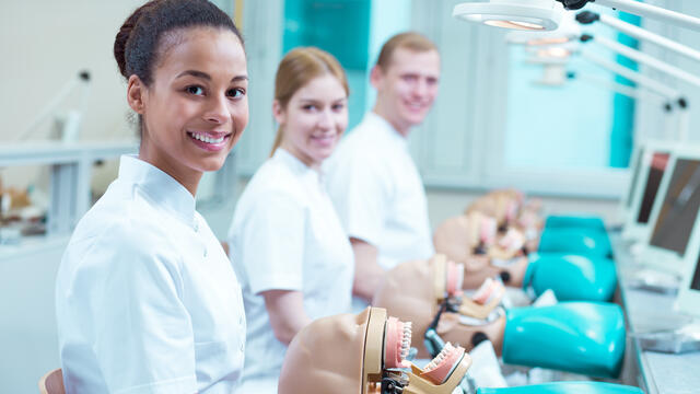 Students with dental manikins