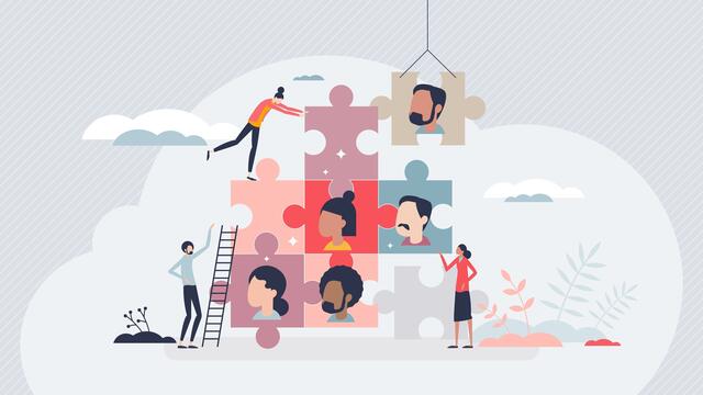 Human resources concept drawing: people pushing interlocking puzzle pieces together