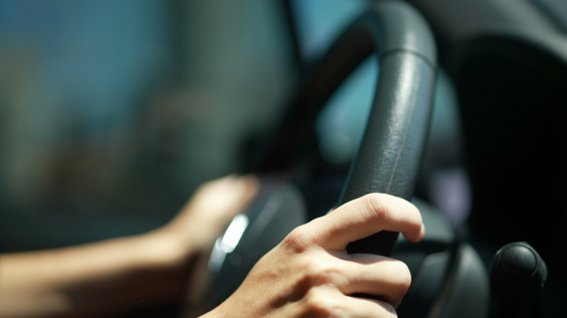 Hands on steering wheel