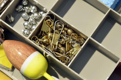 Close up of tackle box with sinkers