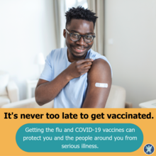 Man showing his vaccine band-aid with text "It's never too late to get vaccinated"