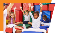 Children doing gymnastics at school