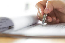 Filling out an application form.