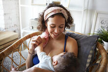 Mom breastfeeding baby